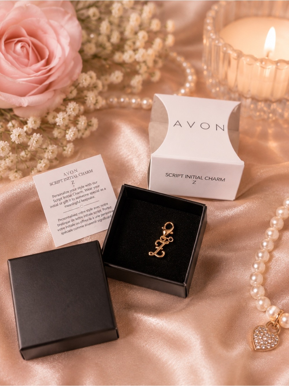 🩷 Avon “z” silver charm.